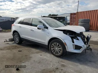 2018 Cadillac XT5 Luxury FWD with VIN 1GYKNCRS8JZ182473, listed as a Copart auction lot 60338405 with 76,595 mi miles and Salvage title. Bid and sale history available at DreamBid. Image 4.