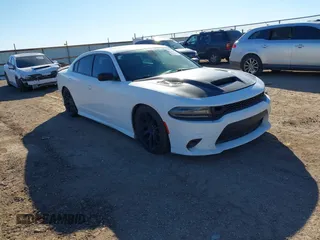 2021 Dodge Charger R/T with VIN 2C3CDXCT4MH588104, listed as a IAAI auction lot 41455312 with 72,162 mi miles and . Bid and sale history available at DreamBid. Image 1.