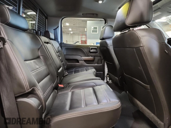 2018 GMC Sierra 1500 Denali z VIN 3GTU2PEJ2JG587157, wystawiony jako Copart lot #58516315 z przebiegiem 88 855 mil mil oraz Szkoda całkowita • Salvage title. Historia ofert i sprzedaży dostępna na DreamBid. Obrazek 10.