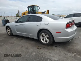 2012 Dodge Charger SE with VIN 2C3CDXBG4CH203207, listed as a Copart auction lot 56910395 with 156,016 mi miles and Salvage Title. Bid and sale history available at DreamBid. Image 2.