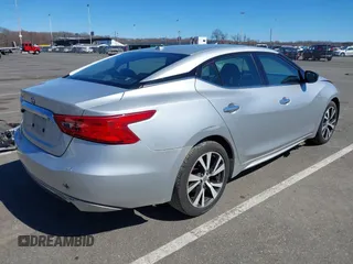 2016 Nissan Maxima SV z VIN 1N4AA6AP0GC905126, wystawiony jako IAAI lot #41849223 z przebiegiem 87 968 mil mil oraz . Historia ofert i sprzedaży dostępna na DreamBid. Obrazek 4.