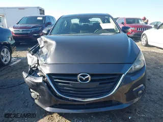 2016 Mazda Mazda3 i Touring with VIN JM1BM1W75G1300144, listed as a IAAI auction lot 41883503 with 112,927 mi miles. Bid and sale history available at carsss.com. Image 13.