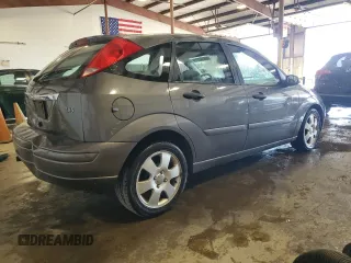 2002 Ford Focus ZX5 z VIN 3FAFP37352R180981, wystawiony jako Copart lot #55856125 z przebiegiem 59 785 mil mil oraz Szkoda całkowita • Salvage title. Historia ofert i sprzedaży dostępna na DreamBid. Obrazek 3.