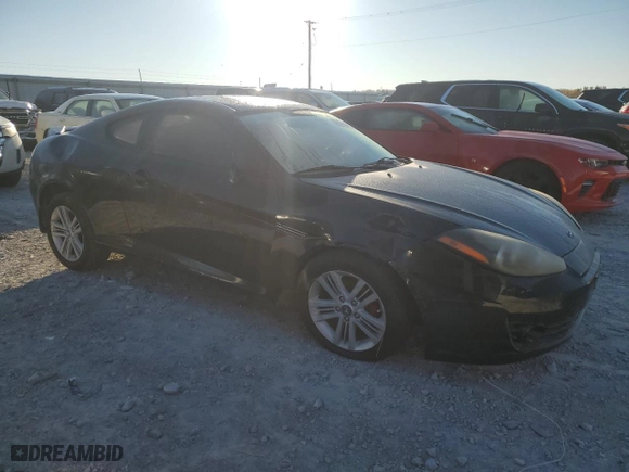 2008 Hyundai Tiburon GS with VIN KMHHM66DX8U291983, listed as a Copart auction lot 74586874 with 111,572 mi miles and Salvage Title. Bid and sale history available at carsss.com. Image 4.