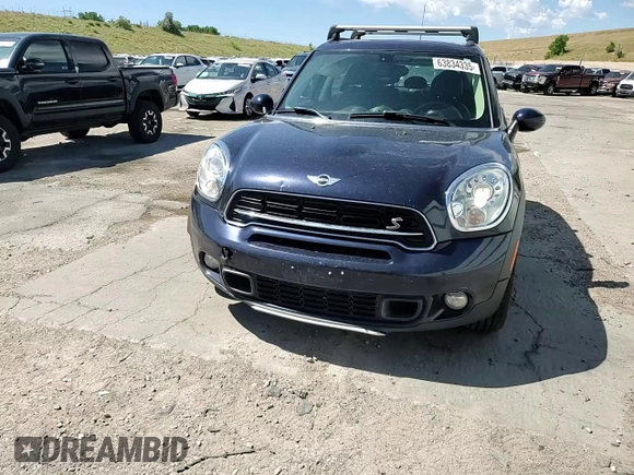 2016 MINI Countryman S with VIN WMWZC5C54GWT38489, listed as a Copart auction lot 63834335 with 102,564 mi miles and Salvage title. Bid and sale history available at DreamBid. Image 13.