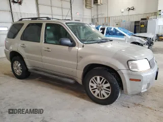 2007 Mercury Mariner Premier with VIN 4M2CU97107KJ05778, listed as a Copart auction lot 60433475 with 218,344 mi miles and Salvage title. Bid and sale history available at DreamBid. Image 4.