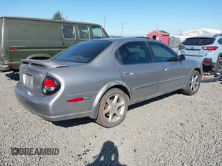 2001 Nissan Maxima GLE z VIN JN1CA31A41T304048, wystawiony jako IAAI lot #42170749 z przebiegiem 215 284 mil mil oraz . Historia ofert i sprzedaży dostępna na DreamBid. Obrazek 4.