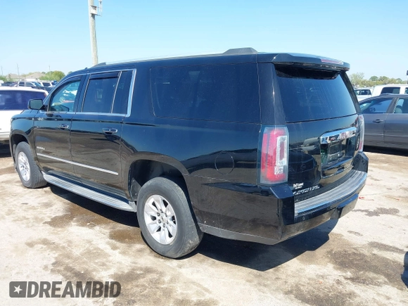 2016 GMC Yukon XL Denali with VIN 1GKS2HKJ2GR111246, listed as a IAAI auction lot 41834364 with 73,418 mi miles. Bid and sale history available at carsss.com. Image 3.
