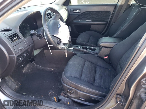 2010 Ford Fusion SE with VIN 3FAHP0HA0AR421199, listed as a Copart auction lot 69568174 with 152,729 mi miles and Salvage Title. Bid and sale history available at DreamBid. Image 7.
