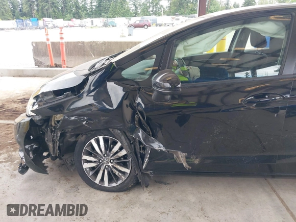 2015 Honda Fit EX-L z VIN 3HGGK5H81FM701122, wystawiony jako IAAI lot #42610165 z przebiegiem 74 969 mil mil oraz . Historia ofert i sprzedaży dostępna na DreamBid. Obrazek 6.