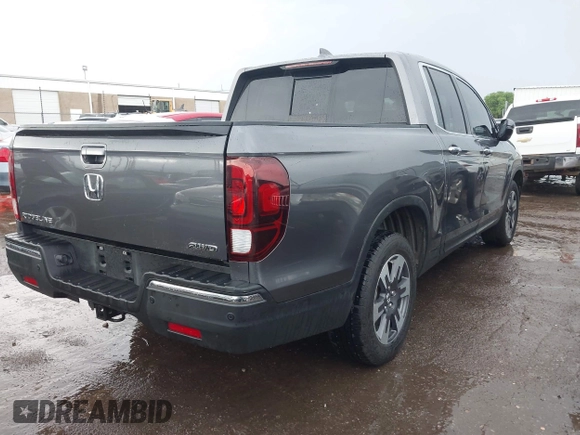 2018 Honda Ridgeline RTL-E with VIN 5FPYK3F74JB012181, listed as a IAAI auction lot 42143197 with 117,520 mi miles and . Bid and sale history available at DreamBid. Image 4.