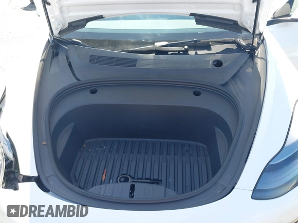 2023 Tesla Model 3 with VIN 5YJ3E1EA0PF621448, listed as a IAAI auction lot 42500155 with 26,589 mi miles and . Bid and sale history available at DreamBid. Image 10.