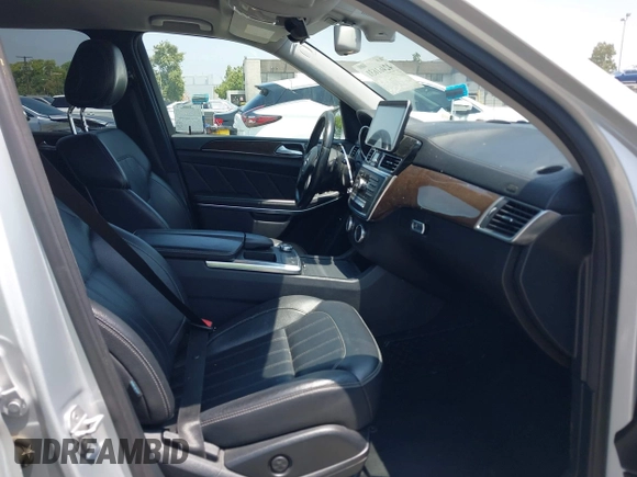2014 Mercedes-Benz GL 450 z VIN 4JGDF7CE9EA411572, wystawiony jako IAAI lot #42461631 z przebiegiem 121 885 mil mil oraz . Historia ofert i sprzedaży dostępna na DreamBid. Obrazek 5.