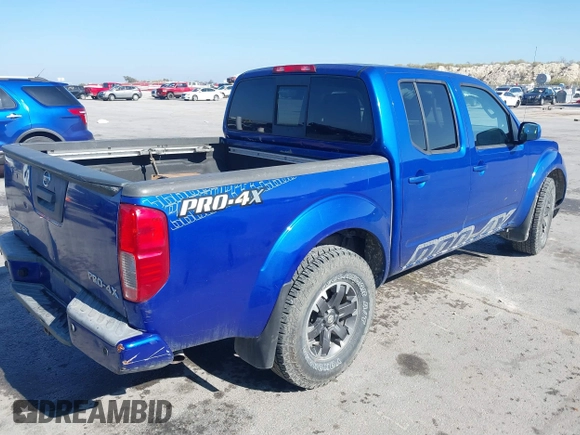2014 Nissan Frontier SV with VIN 1N6AD0EV4EN720325, listed as a IAAI auction lot 41479133 with 61,661 mi miles and . Bid and sale history available at DreamBid. Image 4.