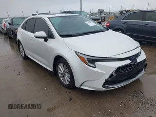 2024 Toyota Corolla Hybrid LE with VIN JTDBCMFE4RJ027221, listed as a IAAI auction lot 41084897 with 10,683 mi miles. Bid and sale history available at carsss.com. Image 1.