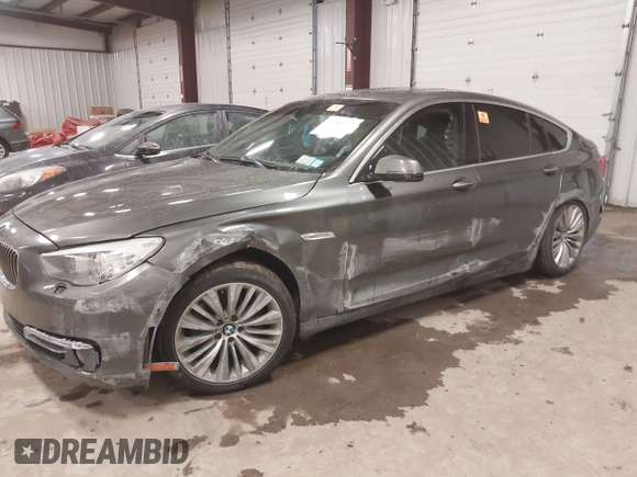 2014 BMW 5 Series 535i Gran Turismo xDrive z VIN WBA5M4C59ED183503, wystawiony jako IAAI lot #41983117 z przebiegiem 136 186 mil mil oraz . Historia ofert i sprzedaży dostępna na DreamBid. Obrazek 6.