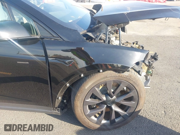 2023 Tesla Model X with VIN 7SAXCDE59PF430836, listed as a IAAI auction lot 41545267 with Not Provided miles and . Bid and sale history available at DreamBid. Image 18.