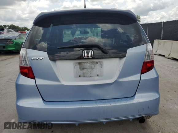 2010 Honda Fit Sport with VIN JHMGE8H64AC032634, listed as a Copart auction lot 61795825 with 143,593 mi miles and Salvage title. Bid and sale history available at DreamBid. Image 6.