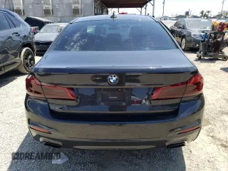 2018 BMW 5 Series 530e with VIN WBAJA9C55JG623181, listed as a Copart auction lot 61593983 with 63,577 mi miles and . Bid and sale history available at DreamBid. Image 6.