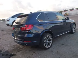 2017 BMW X5 sDrive35i with VIN 5UXKR2C53H0U21044, listed as a IAAI auction lot 41946564 with 54,585 mi miles. Bid and sale history available at carsss.com. Image 4.