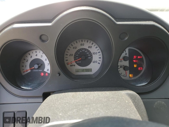 2004 Nissan Frontier XE with VIN 1N6DD26TX4C447116, listed as a Copart auction lot 59432335 with 127,001 mi miles and Salvage title. Bid and sale history available at DreamBid. Image 9.