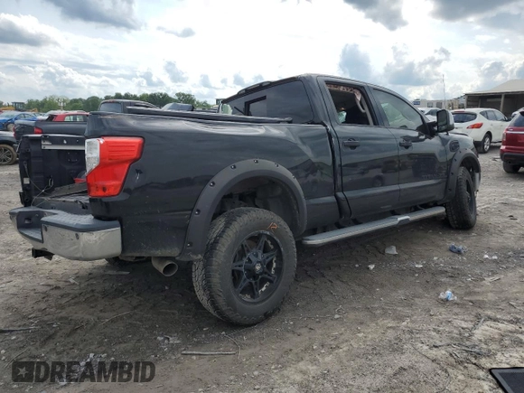 2016 Nissan Titan SL z VIN 1N6BA1F22GN504550, wystawiony jako Copart lot #56616955 z przebiegiem 176 020 mil mil oraz Szkoda całkowita • Salvage title. Historia ofert i sprzedaży dostępna na DreamBid. Obrazek 3.