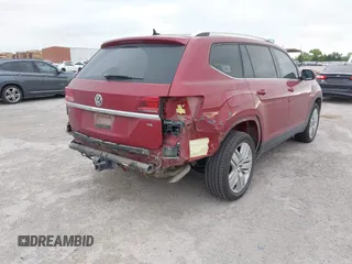 2019 Volkswagen Atlas SE with VIN 1V2WR2CA4KC606661, listed as a IAAI auction lot 42581054 with 89,079 mi miles and . Bid and sale history available at DreamBid. Image 6.