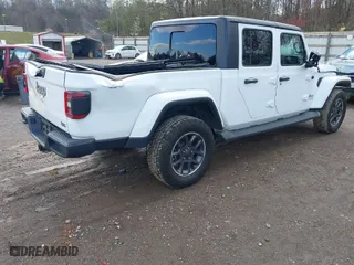 2020 Jeep Gladiator Overland with VIN 1C6HJTFG1LL107641, listed as a IAAI auction lot 41847586 with 69,664 mi miles. Bid and sale history available at carsss.com. Image 4.