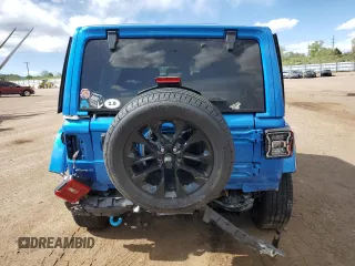 2024 Jeep Wrangler Sahara with VIN 1C4RJXP60RW163829, listed as a Copart auction lot 57182365 with 16,873 mi miles and Salvage title. Bid and sale history available at DreamBid. Image 6.