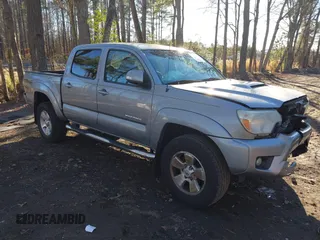 2015 Toyota Tacoma PreRunner z VIN 3TMJU4GNXFM191580, wystawiony jako IAAI lot #41216357 z przebiegiem 78 490 mil mil oraz . Historia ofert i sprzedaży dostępna na DreamBid. Obrazek 1.