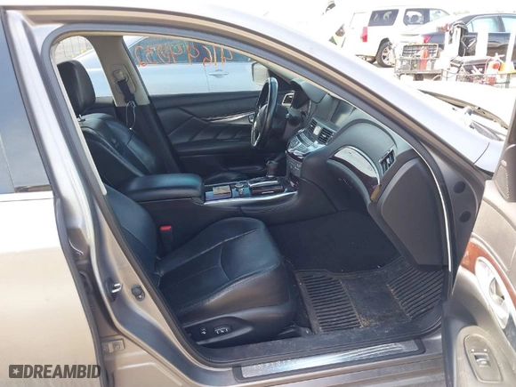 2012 Infiniti M37 with VIN JN1BY1AR9CM396580, listed as a IAAI auction lot 41694032 with 137,197 mi miles. Bid and sale history available at carsss.com. Image 5.
