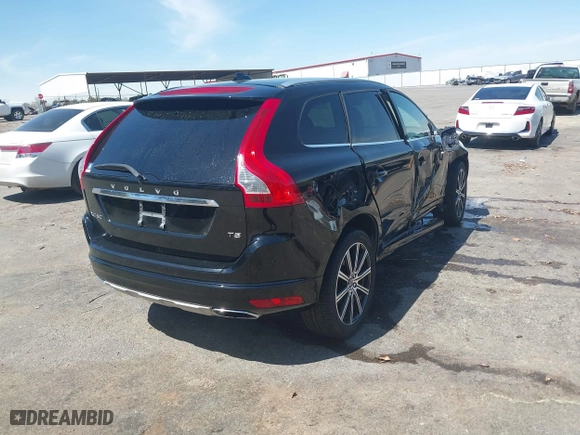 2016 Volvo XC60 T5 Drive-E Premier with VIN YV440MDK0G2857046, listed as a IAAI auction lot 41752649 with 36,896 mi miles. Bid and sale history available at carsss.com. Image 4.