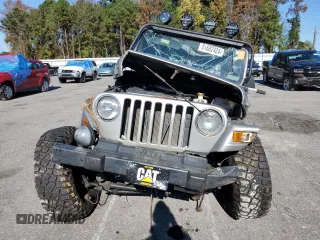 2001 Jeep Wrangler SE with VIN 1J4FA29P71P310653, listed as a Copart auction lot 81682424 with 0 mi miles and Salvage Title. Bid and sale history available at carsss.com. Image 5.