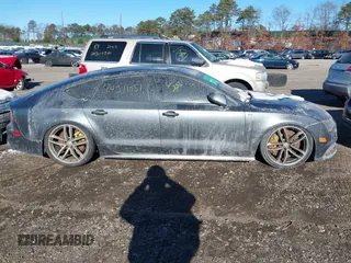 2016 Audi S7 z VIN WAUW2AFCXGN031858, wystawiony jako IAAI lot #41182675 z przebiegiem Nie podano mil oraz . Historia ofert i sprzedaży dostępna na DreamBid. Obrazek 12.