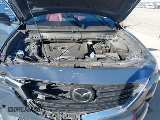2022 Mazda CX-9 Grand Touring with VIN JM3TCBDYXN0625567, listed as a IAAI auction lot 41327380 with 50,672 mi miles and . Bid and sale history available at DreamBid. Image 10.