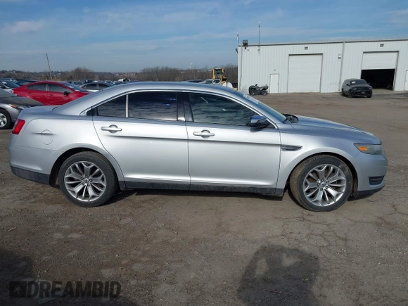2014 Ford Taurus Limited with VIN 1FAHP2F86EG134779, listed as a IAAI auction lot 41660527 with 115,016 mi miles. Bid and sale history available at carsss.com. Image 13.
