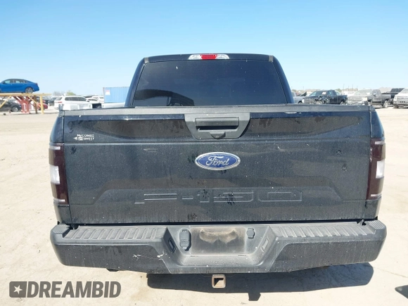 2018 Ford F-150 XL with VIN 1FTEW1E50JKE13640, listed as a IAAI auction lot 41228537 with 146,927 mi miles. Bid and sale history available at carsss.com. Image 16.