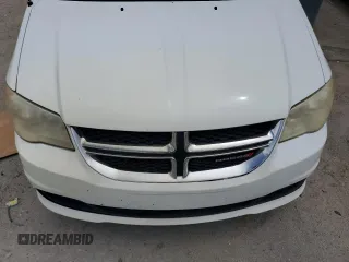 2014 Dodge Grand Caravan SXT z VIN 2C4RDGCG7ER214087, wystawiony jako Copart lot #61096815 z przebiegiem 131 241 mil mil oraz Czysty tytuł • Clean title. Historia ofert i sprzedaży dostępna na DreamBid. Obrazek 12.