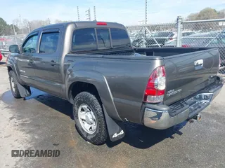 2009 Toyota Tacoma with VIN 3TMLU42N19M024223, listed as a IAAI auction lot 41833027 with 182,206 mi miles and . Bid and sale history available at DreamBid. Image 3.