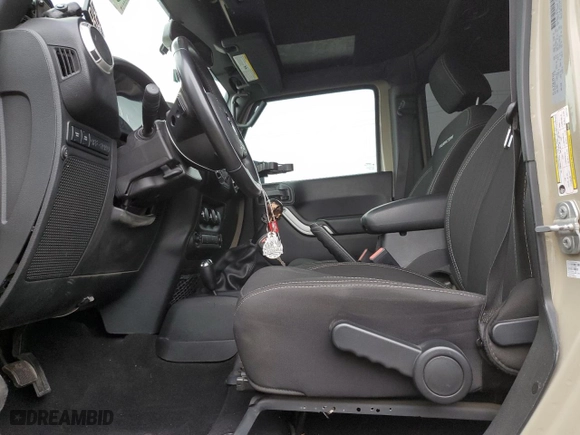 2018 Jeep Wrangler JK Unlimited Rubicon with VIN 1C4BJWFG4JL891312, listed as a Copart auction lot 87041334 with 51,286 mi miles and Salvage Title. Bid and sale history available at carsss.com. Image 7.