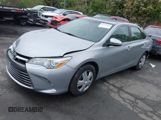 2015 Toyota Camry XLE with VIN 4T4BF1FK6FR475340, listed as a IAAI auction lot 41953834 with 104,041 mi miles. Bid and sale history available at carsss.com. Image 2.