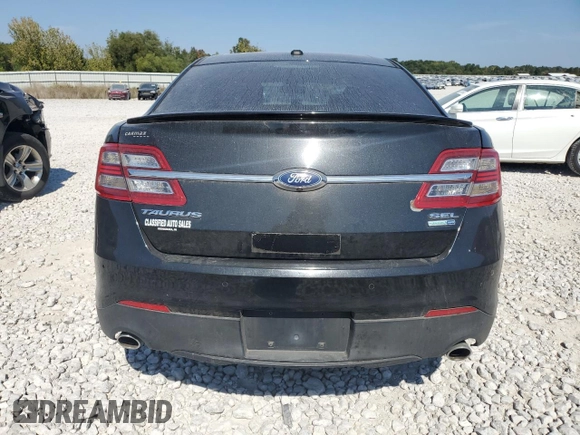 2013 Ford Taurus SEL with VIN 1FAHP2H8XDG229163, listed as a Copart auction lot 71637534 with 120,525 mi miles and Clean Title. Bid and sale history available at DreamBid. Image 6.