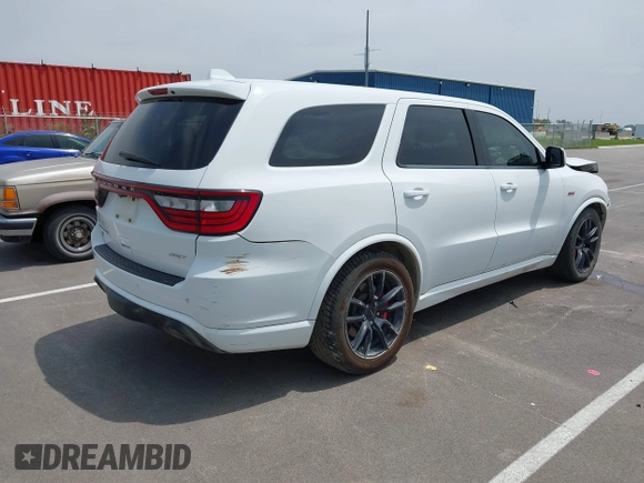 2018 Dodge Durango SRT with VIN 1C4SDJGJ2JC434843, listed as a IAAI auction lot 42434327 with 144,483 mi miles and . Bid and sale history available at DreamBid. Image 4.