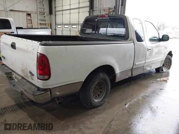 2003 Ford F-150 XL with VIN 1FTRX17W13NB80440, listed as a IAAI auction lot 41460037 with 1 mi miles. Bid and sale history available at carsss.com. Image 4.