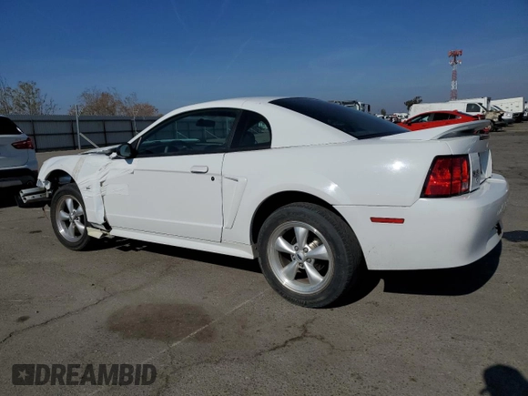 2002 Ford Mustang Standard with VIN 1FAFP40452F182431, listed as a Copart auction lot 79667594 with 66,892 mi miles and Salvage Title. Bid and sale history available at carsss.com. Image 2.