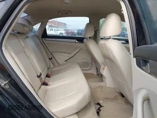 2015 Volkswagen Passat 1.8T Limited Edition with VIN 1VWAT7A36FC051441, listed as a IAAI auction lot 42031494 with 193,354 mi miles. Bid and sale history available at carsss.com. Image 8.