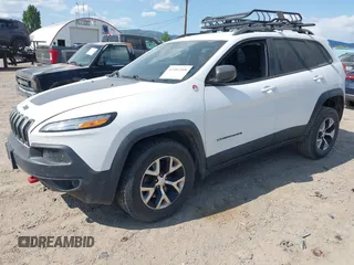 2017 Jeep Cherokee Trailhawk L Plus z VIN 1C4PJMBS9HD238905, wystawiony jako IAAI lot #42381268 z przebiegiem 130 535 mil mil oraz . Historia ofert i sprzedaży dostępna na DreamBid. Obrazek 2.