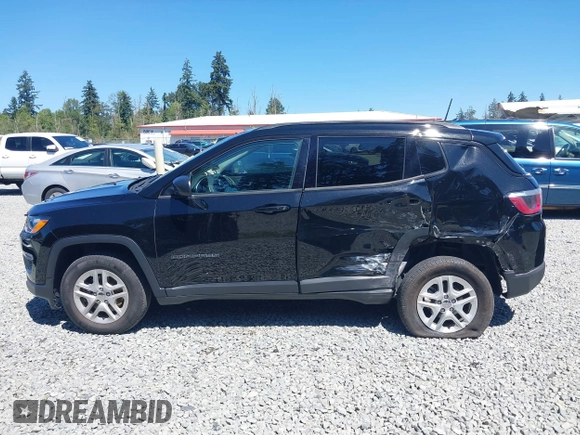 2018 Jeep Compass Sport with VIN 3C4NJDAB1JT261863, listed as a IAAI auction lot 42677037 with 93,263 mi miles and . Bid and sale history available at DreamBid. Image 14.