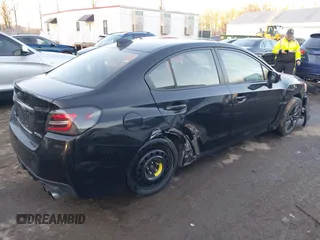2015 Subaru WRX with VIN JF1VA1A60F9831858, listed as a IAAI auction lot 41360764 with 99,199 mi miles. Bid and sale history available at carsss.com. Image 4.