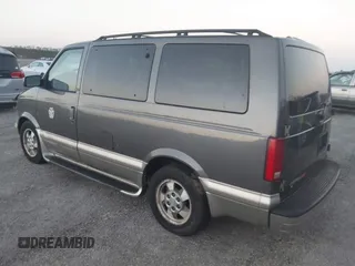 2003 Chevrolet Astro z VIN 1GNEL19X63B115821, wystawiony jako IAAI lot #41923632 z przebiegiem 107 341 mil mil oraz . Historia ofert i sprzedaży dostępna na DreamBid. Obrazek 3.